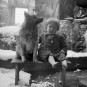 Marica s psičkom na ruševinah svojega doma v Papežih leta 1945. / Marica with a dog in the ruins of her home in Papeži in 1945. Foto / Photo: Edi Šelhaus TN-944/6